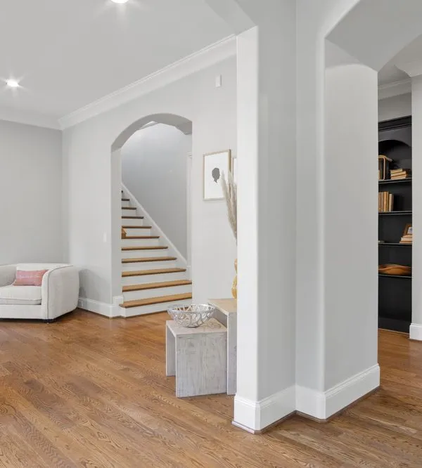 A finished entry and stairway, walls and trim freshly painted